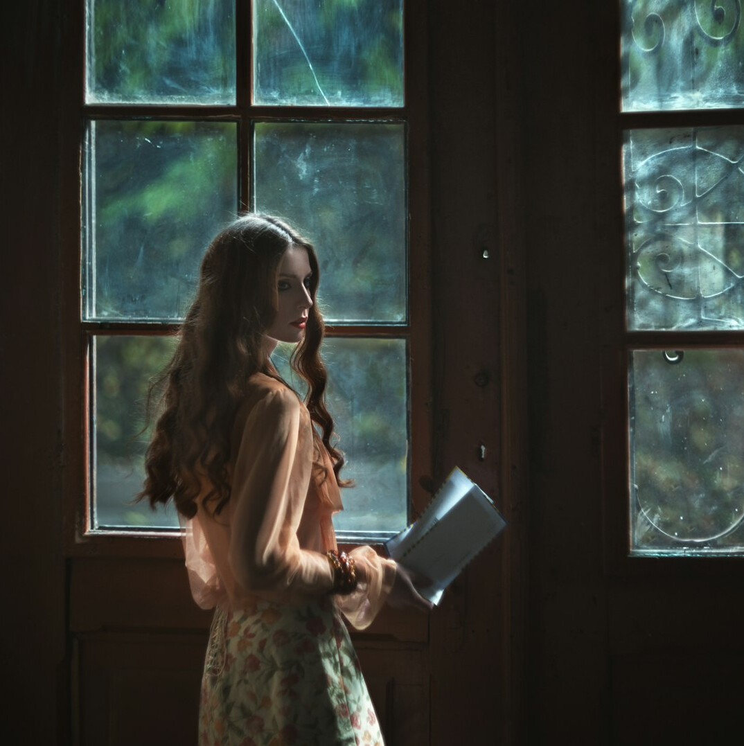detective reading old book
